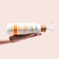 Simply Body Lotion | Raw Coconut + Mango | 18 Fl Oz -Skin Care Specials Store RS HW Mango Hand 1280x1920px